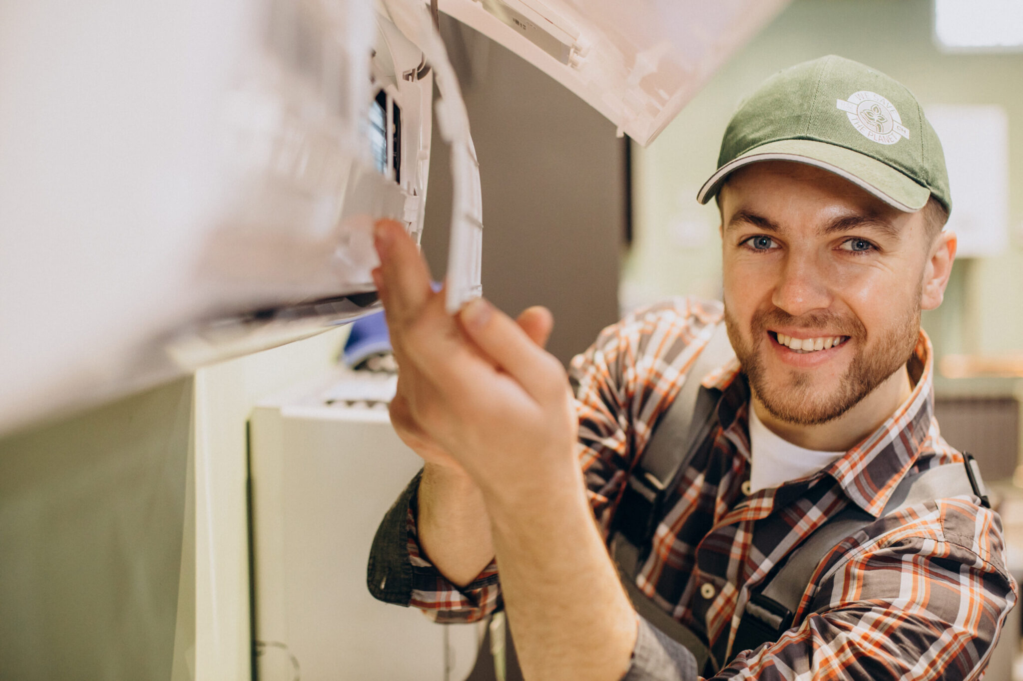 repairman-doing-air-conditioner-service-scaled.jpg